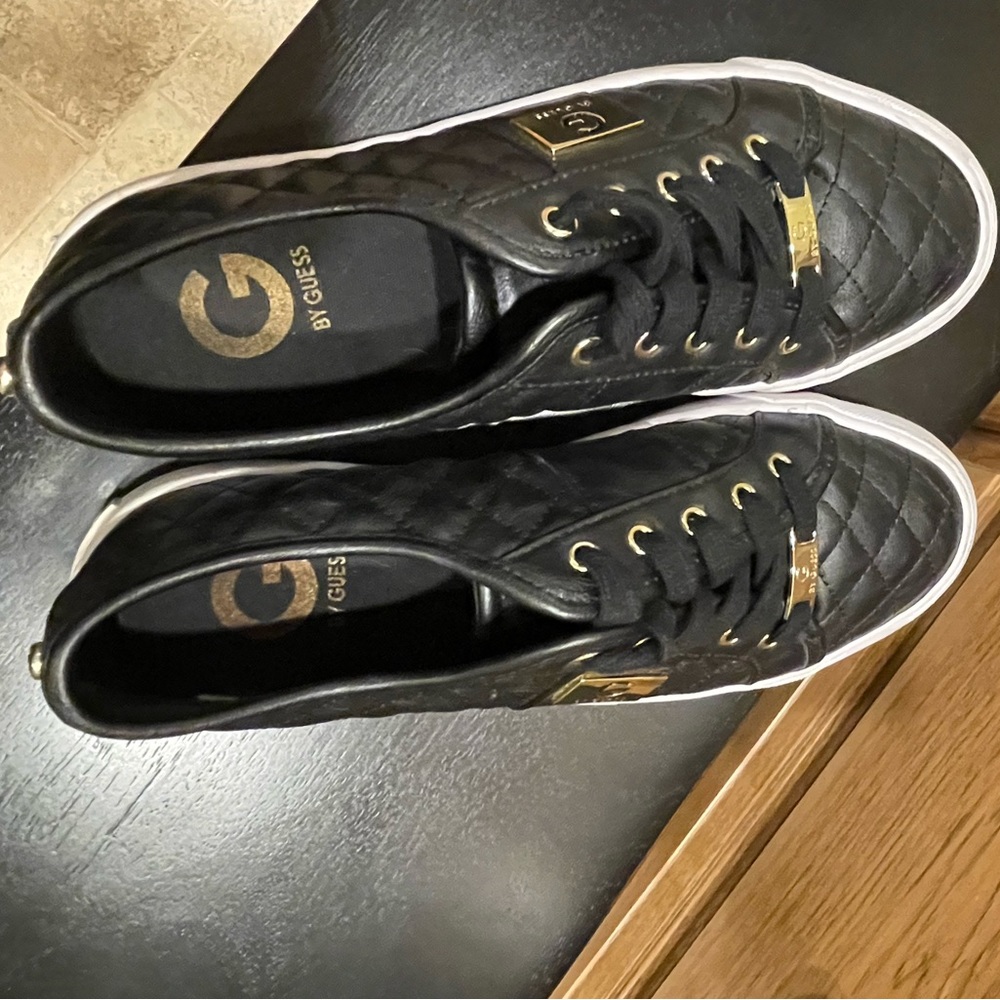 Guess(Black/Gold) Shoes. Size 8M